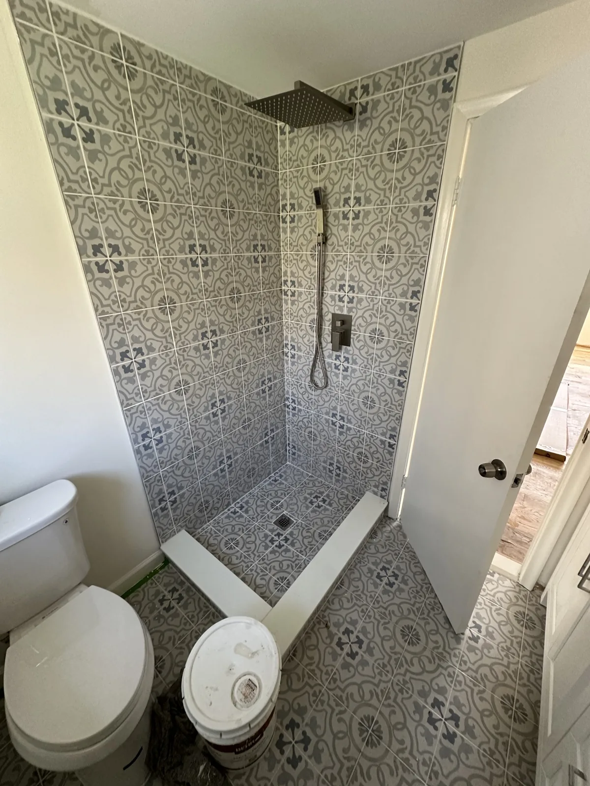 Patterned geometric tile shower install